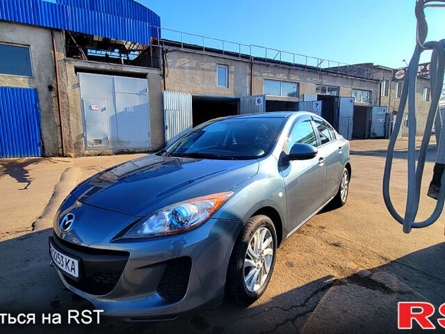 Серый Мазда 3, объемом двигателя 2 л и пробегом 170 тыс. км за 7300 $, фото 3 на Automoto.ua