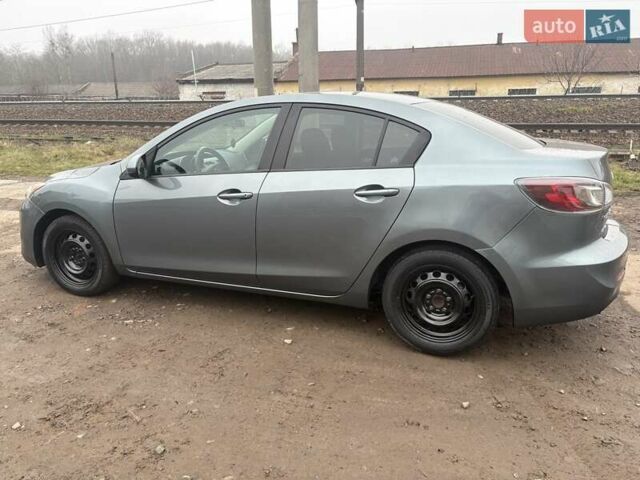 Серый Мазда 3, объемом двигателя 2 л и пробегом 212 тыс. км за 7500 $, фото 4 на Automoto.ua