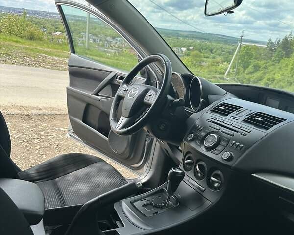 Сірий Мазда 3, об'ємом двигуна 2 л та пробігом 320 тис. км за 7000 $, фото 9 на Automoto.ua