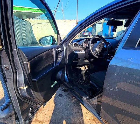 Серый Мазда 3, объемом двигателя 2 л и пробегом 170 тыс. км за 7300 $, фото 9 на Automoto.ua