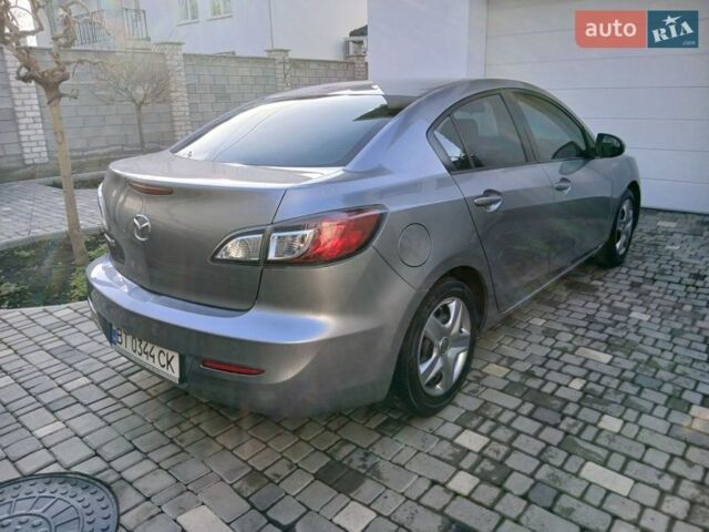 Серый Мазда 3, объемом двигателя 2 л и пробегом 141 тыс. км за 8000 $, фото 3 на Automoto.ua