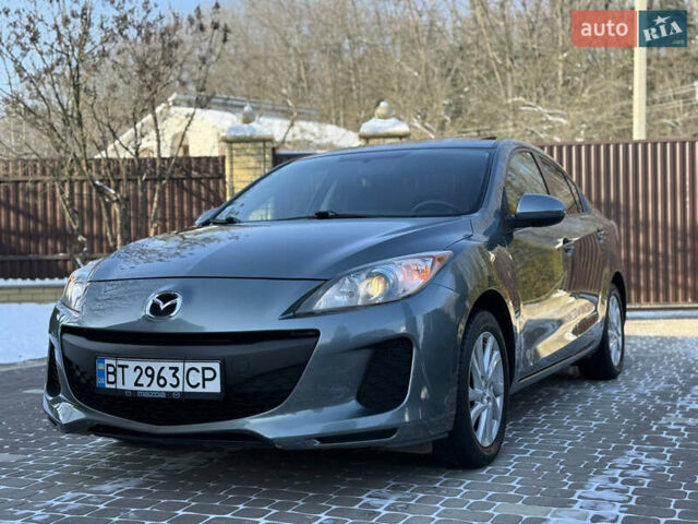 Сірий Мазда 3, об'ємом двигуна 2 л та пробігом 214 тис. км за 7250 $, фото 6 на Automoto.ua