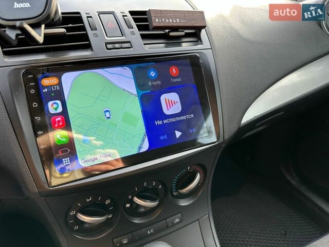 Серый Мазда 3, объемом двигателя 2 л и пробегом 211 тыс. км за 6300 $, фото 28 на Automoto.ua