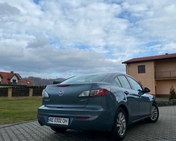 Серый Мазда 3, объемом двигателя 2 л и пробегом 232 тыс. км за 7200 $, фото 1 на Automoto.ua