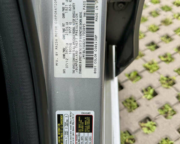 Серый Мазда 3, объемом двигателя 2 л и пробегом 90 тыс. км за 8300 $, фото 28 на Automoto.ua