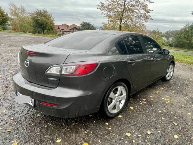 Серый Мазда 3, объемом двигателя 2 л и пробегом 206 тыс. км за 7190 $, фото 1 на Automoto.ua