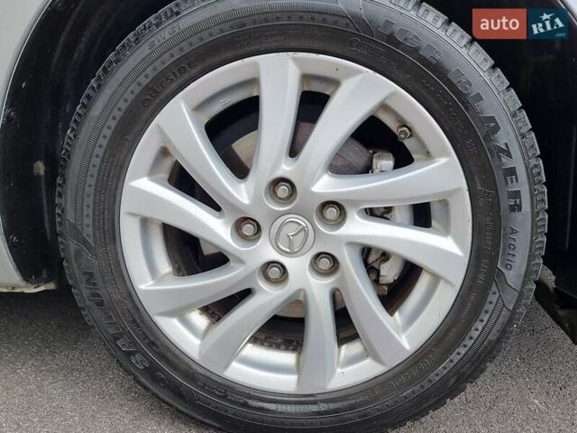 Серый Мазда 3, объемом двигателя 2 л и пробегом 190 тыс. км за 6999 $, фото 2 на Automoto.ua