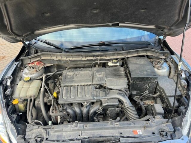 Серый Мазда 3, объемом двигателя 1.6 л и пробегом 278 тыс. км за 6800 $, фото 6 на Automoto.ua