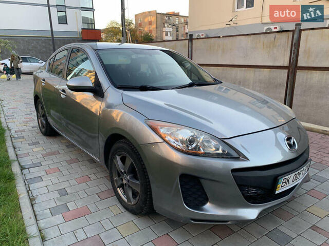 Сірий Мазда 3, об'ємом двигуна 2 л та пробігом 130 тис. км за 7350 $, фото 4 на Automoto.ua