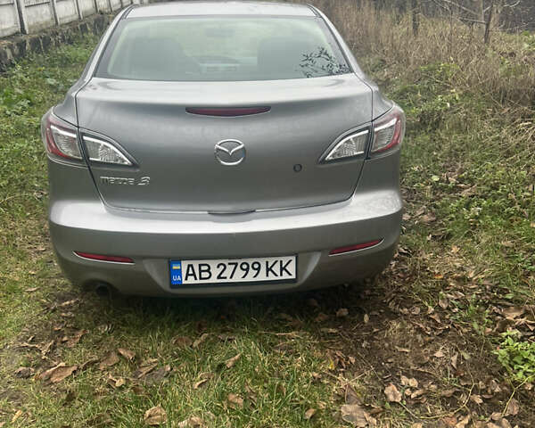 Сірий Мазда 3, об'ємом двигуна 2 л та пробігом 177 тис. км за 7999 $, фото 2 на Automoto.ua