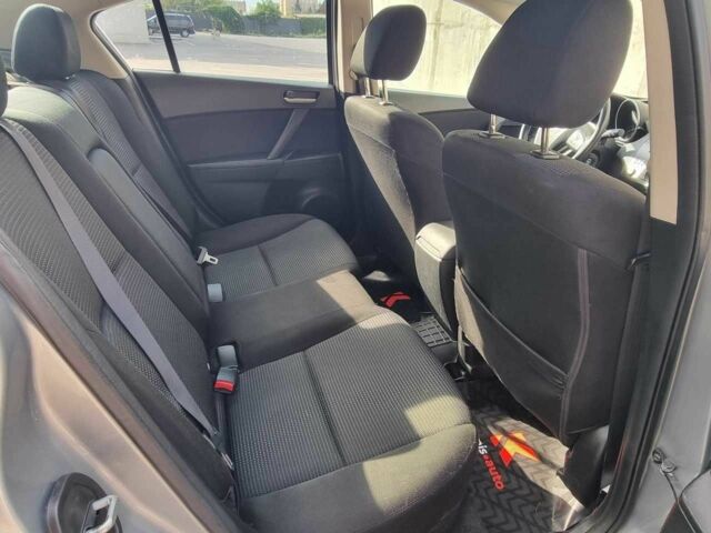 Сірий Мазда 3, об'ємом двигуна 2 л та пробігом 190 тис. км за 7599 $, фото 9 на Automoto.ua