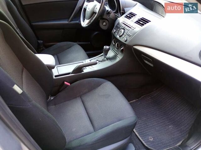 Серый Мазда 3, объемом двигателя 2 л и пробегом 181 тыс. км за 7700 $, фото 15 на Automoto.ua