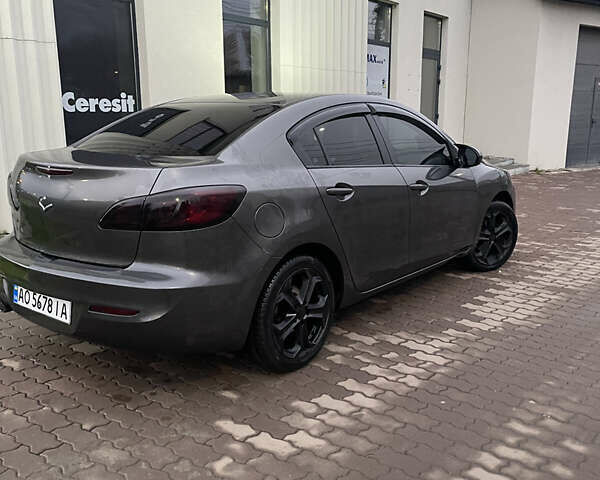 Серый Мазда 3, объемом двигателя 2 л и пробегом 250 тыс. км за 6400 $, фото 3 на Automoto.ua