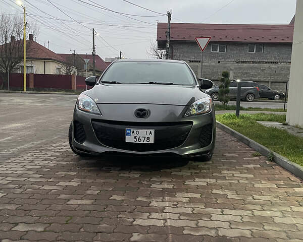 Серый Мазда 3, объемом двигателя 2 л и пробегом 250 тыс. км за 6400 $, фото 1 на Automoto.ua