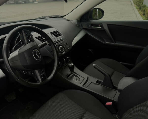 Серый Мазда 3, объемом двигателя 2 л и пробегом 201 тыс. км за 7000 $, фото 36 на Automoto.ua