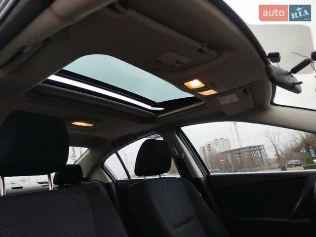 Серый Мазда 3, объемом двигателя 2 л и пробегом 232 тыс. км за 7799 $, фото 44 на Automoto.ua