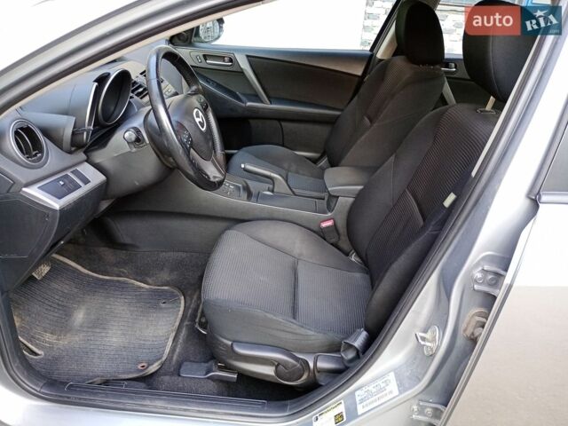 Серый Мазда 3, объемом двигателя 2 л и пробегом 181 тыс. км за 6300 $, фото 9 на Automoto.ua