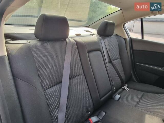 Серый Мазда 3, объемом двигателя 2 л и пробегом 190 тыс. км за 6999 $, фото 61 на Automoto.ua