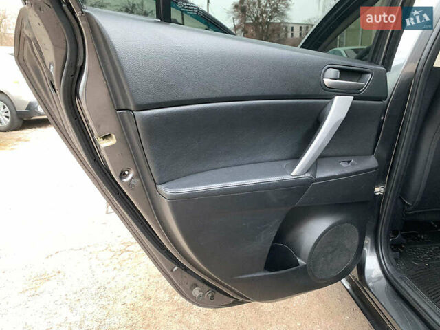 Серый Мазда 3, объемом двигателя 2 л и пробегом 254 тыс. км за 7990 $, фото 18 на Automoto.ua