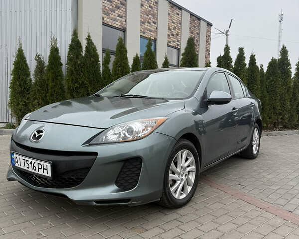 Серый Мазда 3, объемом двигателя 2 л и пробегом 201 тыс. км за 7000 $, фото 2 на Automoto.ua