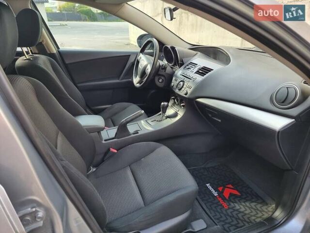Серый Мазда 3, объемом двигателя 2 л и пробегом 190 тыс. км за 6999 $, фото 48 на Automoto.ua