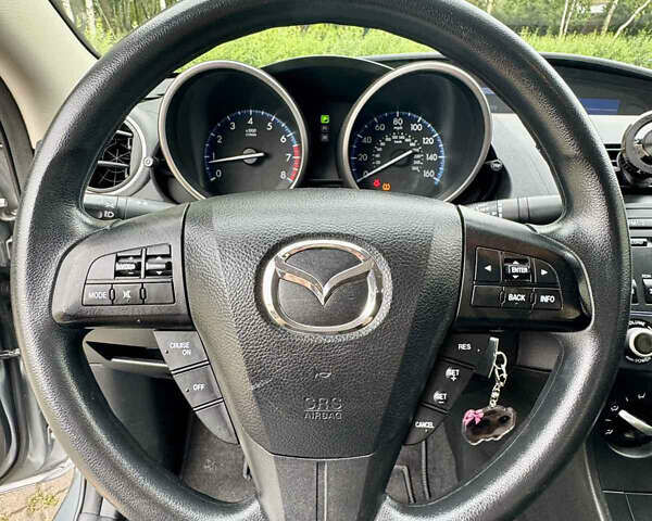 Серый Мазда 3, объемом двигателя 2 л и пробегом 90 тыс. км за 8300 $, фото 25 на Automoto.ua