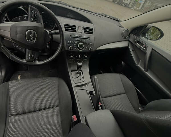 Серый Мазда 3, объемом двигателя 2 л и пробегом 201 тыс. км за 7000 $, фото 37 на Automoto.ua