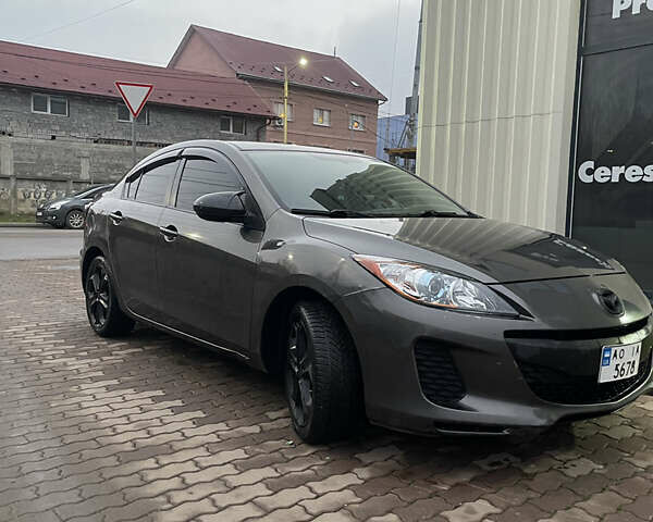 Серый Мазда 3, объемом двигателя 2 л и пробегом 250 тыс. км за 6400 $, фото 2 на Automoto.ua
