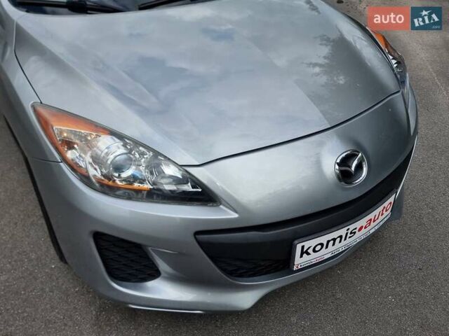 Серый Мазда 3, объемом двигателя 2 л и пробегом 190 тыс. км за 6999 $, фото 11 на Automoto.ua
