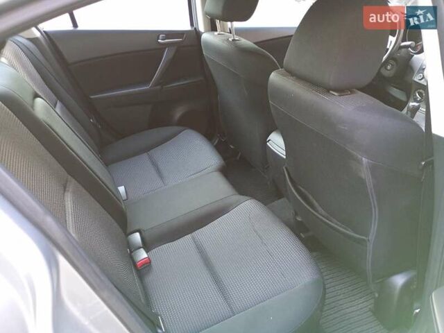 Серый Мазда 3, объемом двигателя 2 л и пробегом 181 тыс. км за 7700 $, фото 16 на Automoto.ua