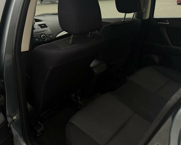 Серый Мазда 3, объемом двигателя 2 л и пробегом 201 тыс. км за 7000 $, фото 28 на Automoto.ua