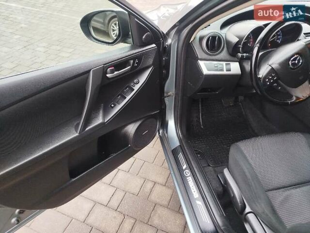 Серый Мазда 3, объемом двигателя 2 л и пробегом 232 тыс. км за 7799 $, фото 28 на Automoto.ua