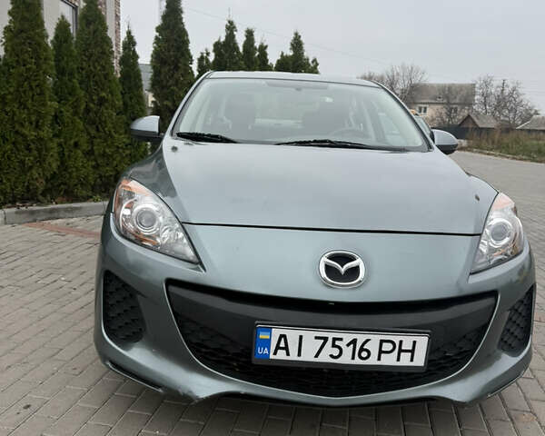 Серый Мазда 3, объемом двигателя 2 л и пробегом 201 тыс. км за 7000 $, фото 9 на Automoto.ua