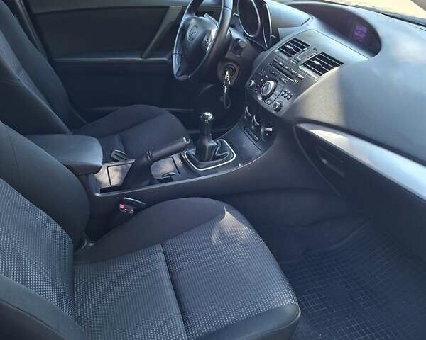 Сірий Мазда 3, об'ємом двигуна 1.6 л та пробігом 160 тис. км за 7700 $, фото 14 на Automoto.ua