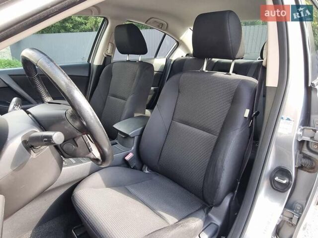Серый Мазда 3, объемом двигателя 2 л и пробегом 190 тыс. км за 6999 $, фото 42 на Automoto.ua