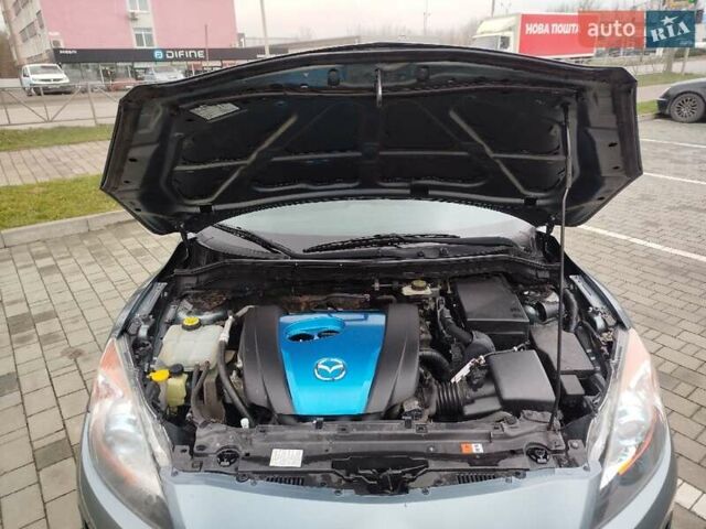 Серый Мазда 3, объемом двигателя 2 л и пробегом 232 тыс. км за 7799 $, фото 49 на Automoto.ua