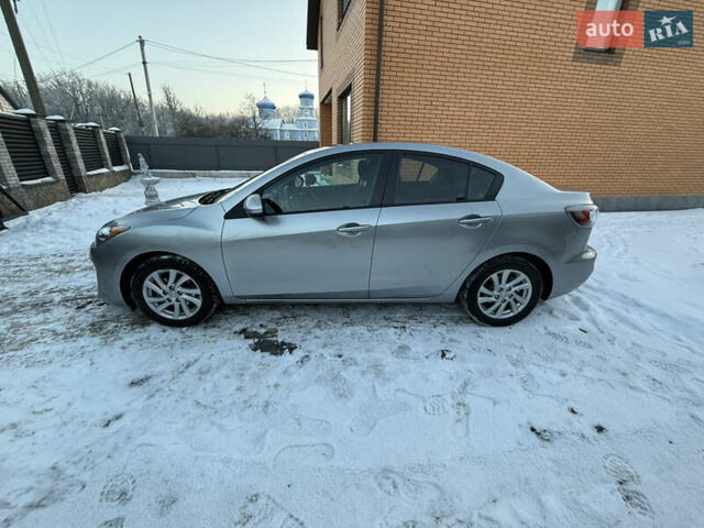 Серый Мазда 3, объемом двигателя 2 л и пробегом 192 тыс. км за 6700 $, фото 6 на Automoto.ua