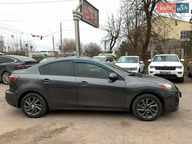 Серый Мазда 3, объемом двигателя 2 л и пробегом 254 тыс. км за 7990 $, фото 3 на Automoto.ua