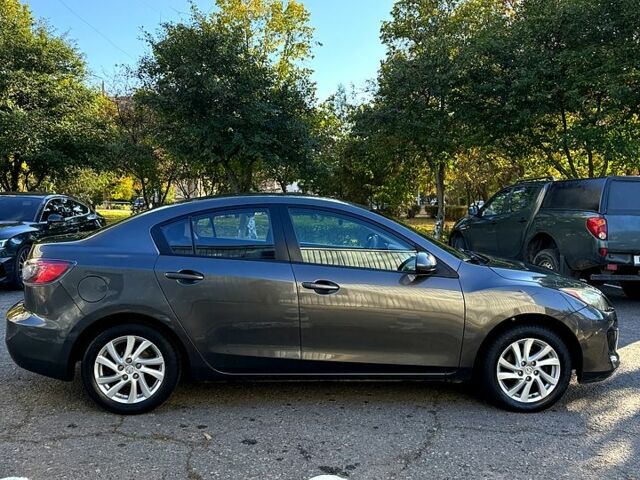 Сірий Мазда 3, об'ємом двигуна 2 л та пробігом 201 тис. км за 7500 $, фото 1 на Automoto.ua