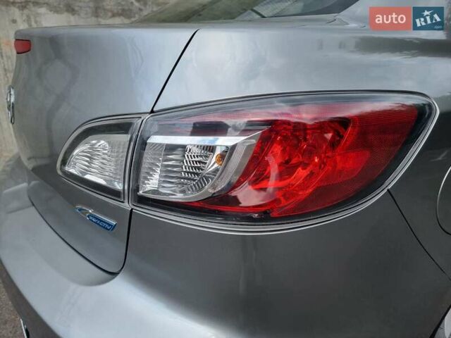 Серый Мазда 3, объемом двигателя 2 л и пробегом 190 тыс. км за 6999 $, фото 19 на Automoto.ua