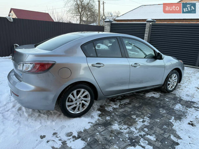 Серый Мазда 3, объемом двигателя 2 л и пробегом 192 тыс. км за 6700 $, фото 12 на Automoto.ua