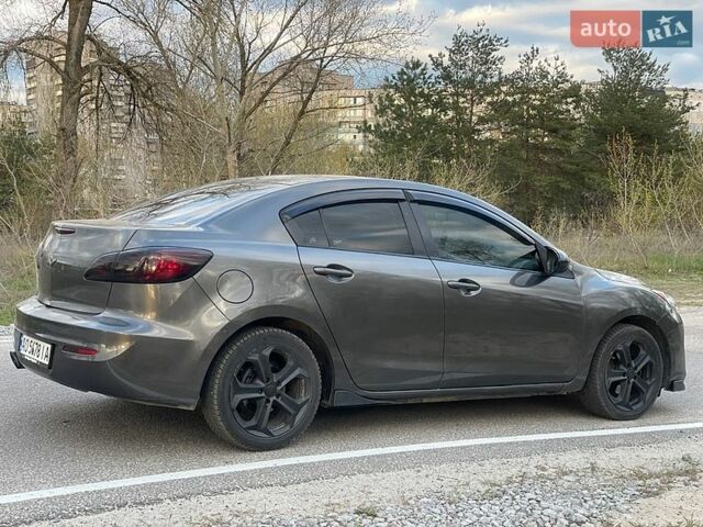 Серый Мазда 3, объемом двигателя 2 л и пробегом 297 тыс. км за 7300 $, фото 7 на Automoto.ua