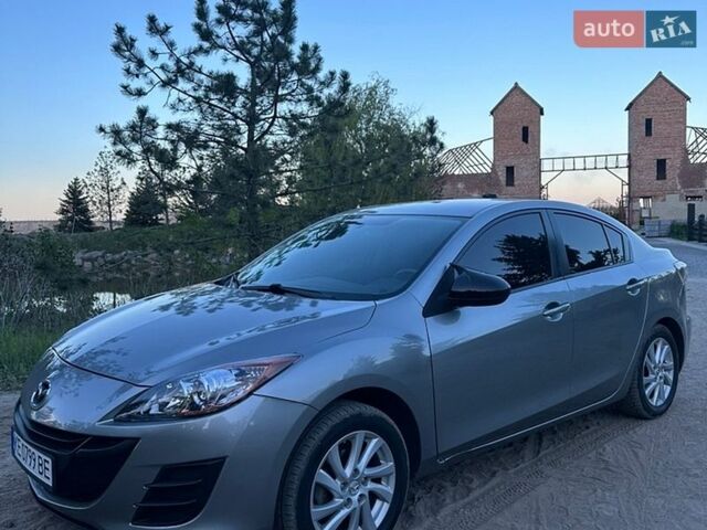 Серый Мазда 3, объемом двигателя 2 л и пробегом 152 тыс. км за 7500 $, фото 1 на Automoto.ua