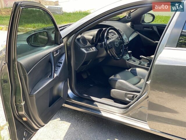 Серый Мазда 3, объемом двигателя 2 л и пробегом 290 тыс. км за 7777 $, фото 7 на Automoto.ua