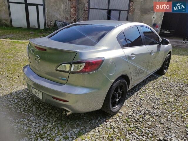 Сірий Мазда 3, об'ємом двигуна 2 л та пробігом 196 тис. км за 7800 $, фото 15 на Automoto.ua