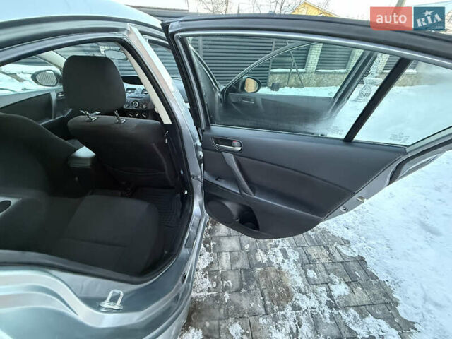 Серый Мазда 3, объемом двигателя 2 л и пробегом 192 тыс. км за 6700 $, фото 19 на Automoto.ua