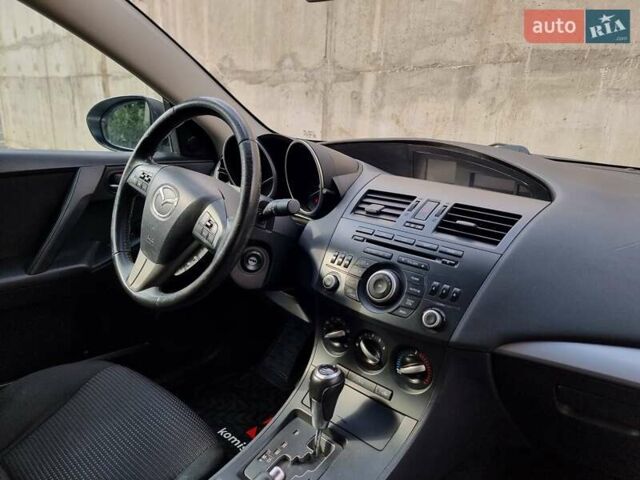 Серый Мазда 3, объемом двигателя 2 л и пробегом 190 тыс. км за 6999 $, фото 50 на Automoto.ua