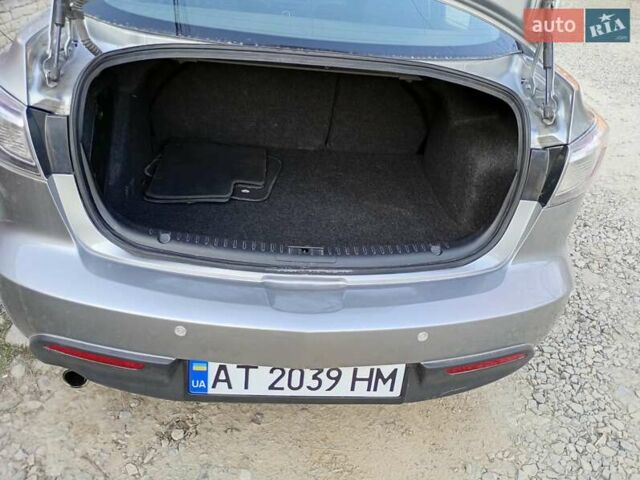 Серый Мазда 3, объемом двигателя 2 л и пробегом 181 тыс. км за 7700 $, фото 18 на Automoto.ua
