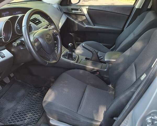 Сірий Мазда 3, об'ємом двигуна 1.6 л та пробігом 160 тис. км за 7700 $, фото 15 на Automoto.ua