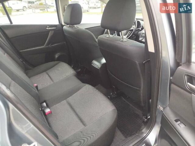 Серый Мазда 3, объемом двигателя 2 л и пробегом 232 тыс. км за 7799 $, фото 52 на Automoto.ua